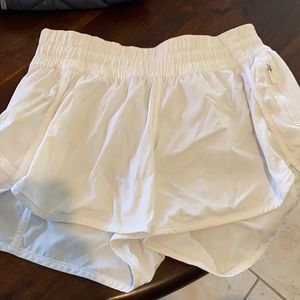 white lululemon running shorts